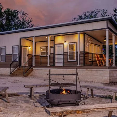 Tranquil Lakefront Retreat: 1BR Cabin with Covered Patio & Private Dock