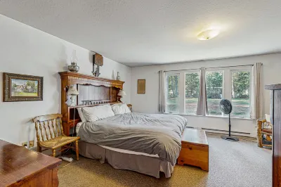 Rustic riverfront house with wood stove & valley views from private deck Hotels near Eagle Ridge RV Park
