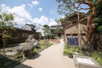 Travel Stop UNNOWA Hotels in Tomi