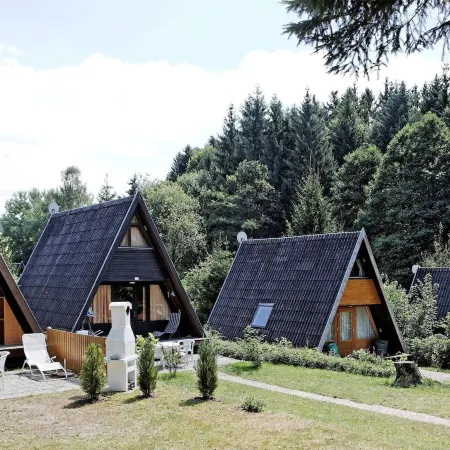Wooden Chalet with Terrace Near Swimming Lake