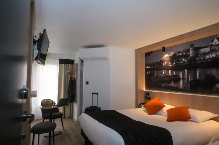 Logis Hôtel Angers Sud Отели рядом с достопримечательностью «Ancien couvent de la Baumette»