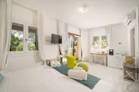 Geco di Giada Exclusive Art Suites Hôtels à : Marinella