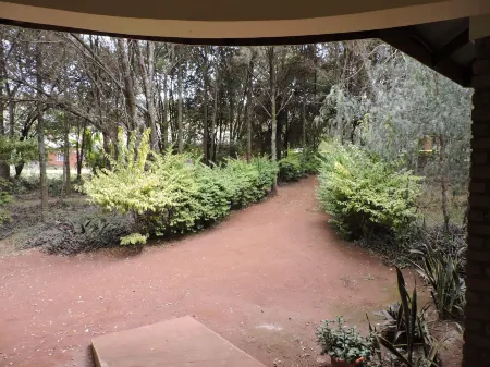 Perigrin Rest House Отели рядом с достопримечательностью «Lake Duluti»