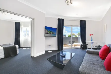 Sydney Airport Suites Отели в г. Маскот