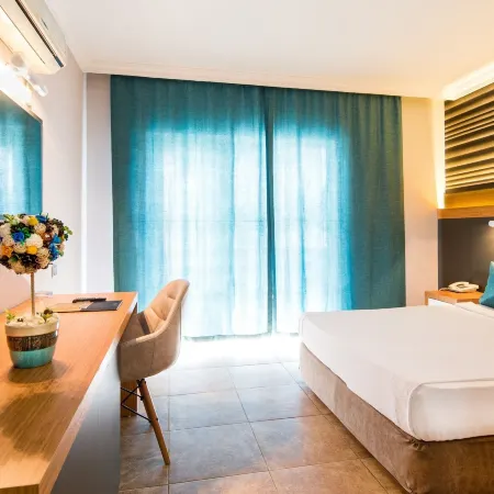 Club Hotel Sunbel Отели рядом с достопримечательностью «Пляж Бельдиби»