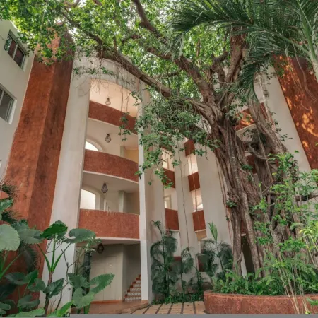 Modern 2BHK w Rooftop Pool 10 Mins Drive to Beach