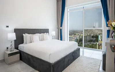 Homesgetaway -Spacious 1Br Apt in Pearlz by Danube Отели в г. Джебел Али Виллидж