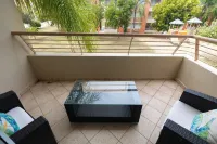 Coqui Beach Home, Paseo del Faro Combate