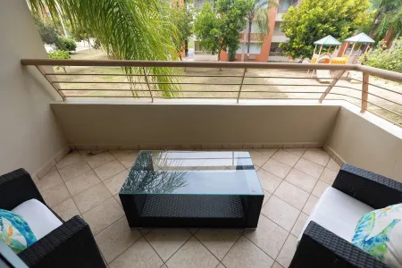 Coqui Beach Home, Paseo del Faro Combate