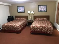 Travelers Inn Hotel a 