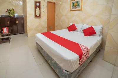 RedDoorz @ Pvc Pension Haus Hotels in Тагум