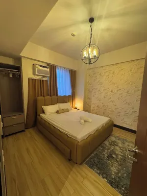 Modern 2-Bedroom Condo in Vibrant Araneta City, QC - Homestays