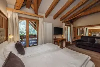 Boutique Hotel e Chalets Salvadori فنادق في Cogolo