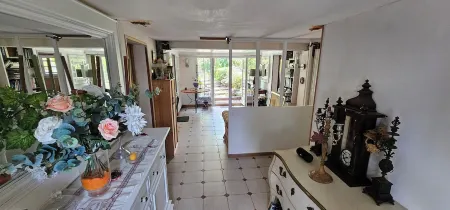 Garden level of the house, in a green setting