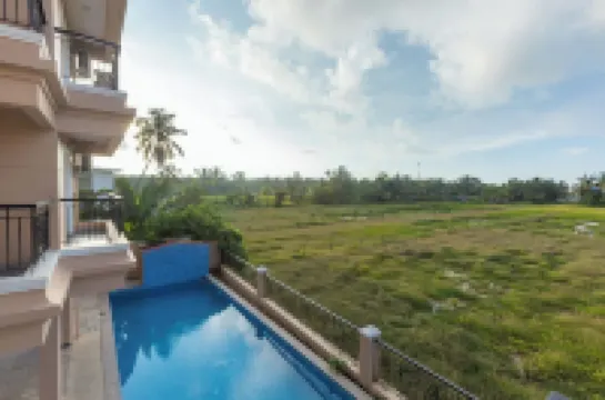 Palm Retreat 1BHK Pool & Field Views