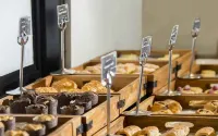 Grand Rohan Jogja - servizio colazione
