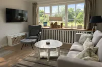 Bright apartment with direct access to the garden