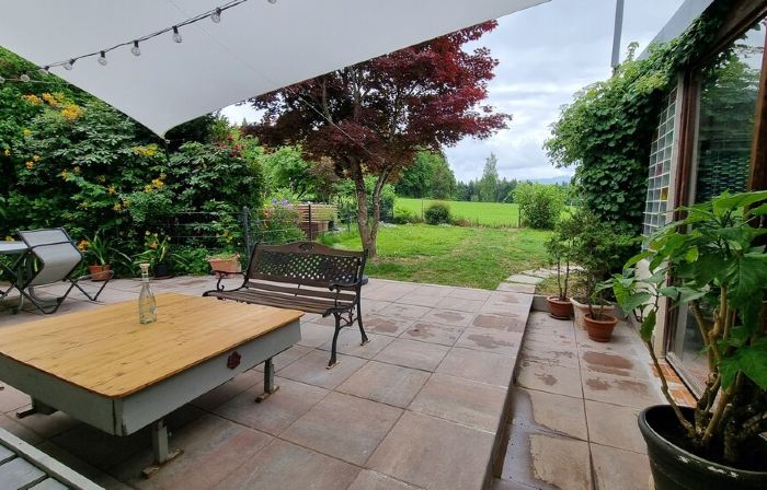 Holiday home with garden and mountain view