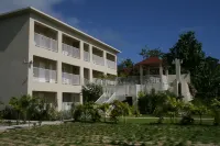 Golden Shore Resort Hotels near Lyssons Beach