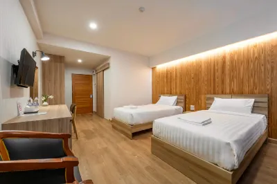 Kio Hotel Korat Hôtels à proximité de : Wat Nong Samong