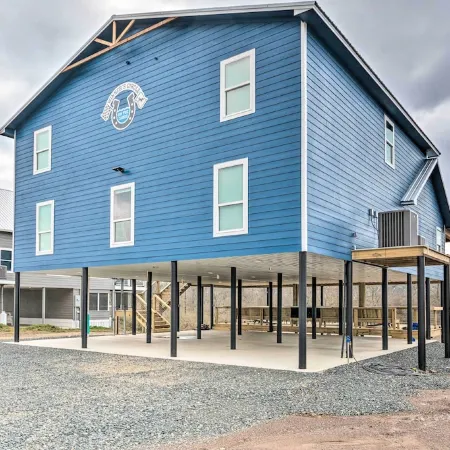 Upscale Riverfront Home w/ Beach & Fire Pit!