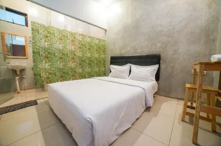 Umbrella Hotel Syariah by My Hospitality Отели в г. Cипутат