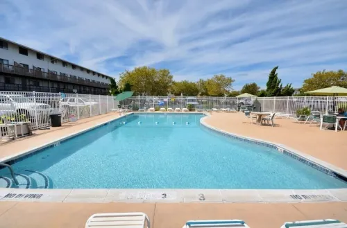 Lovely Renovated 2-Level Condo + Pool + Steps to the Beach!