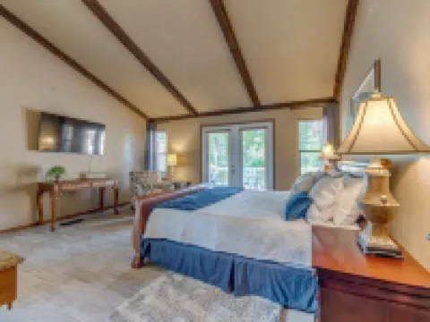 Quiet, spacious home with large deck in secluded Forest Oaks in central Edmond .