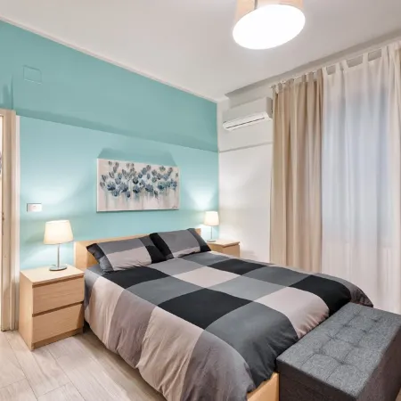 Large apartment between beach and city- With parking and private beach.