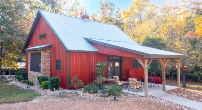 Red Cabin on Kentucky Lake.  Peaceful and pet friendly with a partial lake view.