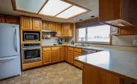Lakefront Getaway. Private Waterfront Home with Dock and Sunroom.