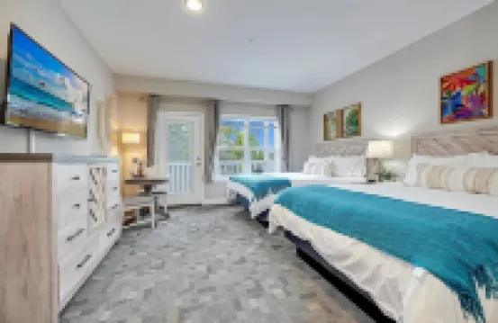 No Cleaning Fee! Brand New Double Queen Studio Condo w/ Waterfront Pool + Beach