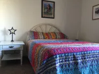 Fully furnished 3 bedroom ranch style home with large screened in porch w/garage