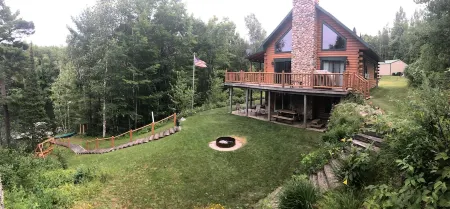Log Cabin style lake house on Sea Lion Lake