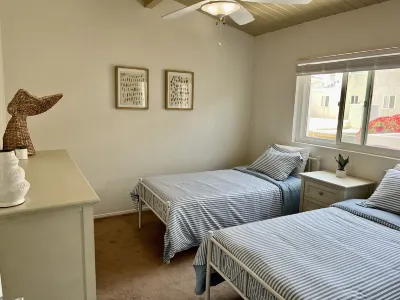 Updated Balboa Peninsula duplex bungalow…steps from the sand!