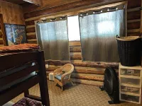 Relaxing log cabin retreat!Private hot tub, Fido Friendly,WI-FI,Snomobile access