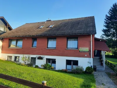 A spacious, family-friendly apartment with a large garden