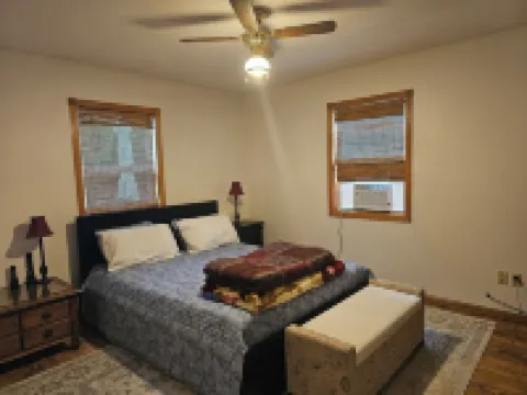 Relax in 3 bed, 2 bath house on quiet 2 acres with private lake.