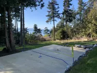 Amazing sunsets!! Water view, hot tub, close to town, fire pit.