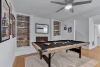 Luxurious 4Bd Near Downtown and Rdu, with Sunroom, Theatre, Games, & More!