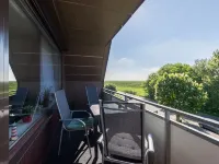 Apartment behind the dike Hotels in Westerdeichstrich