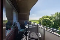 Apartment behind the dike