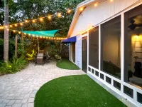 Shaded Yard and Cozy Living Spaces - Charming Coastal Retreat