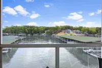 Screened Patio and Two Swimming Pools - Charming Waterfront Oasis