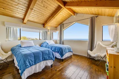 Stunning home with sweeping ocean views, private hot tub & outdoor living