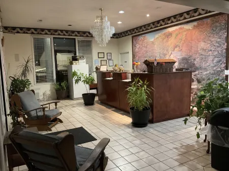 Covered Bridge Inn & Suites Отели в г. Онеонта