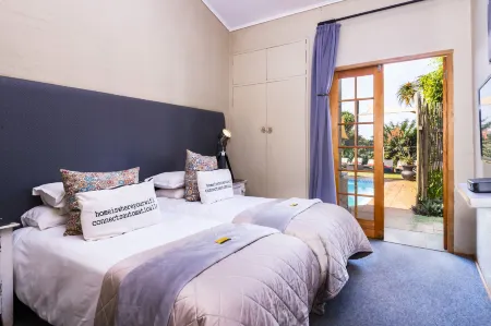 Ama Zulu Guesthouse & Safaris Отели рядом с достопримечательностью «Thanda Safari - Private Game Reserve»