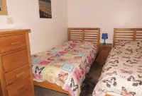 A Sea and Mountain Panorama from this charming stone barn