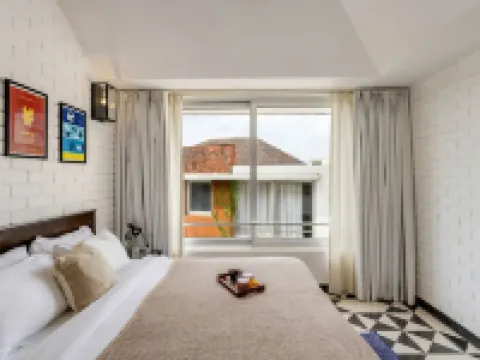 Modern 2BHK w Rooftop Pool 10 Mins Drive to Beach Hotels in Nerul