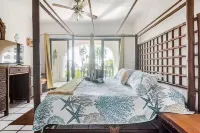 Beachfront 3b ground-level condo with stunning Caribbean Sea views in Playacar 1